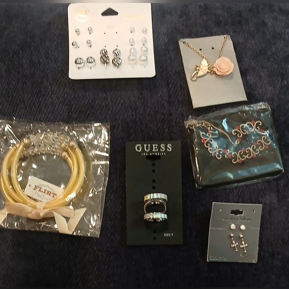 Guess Silver and Gold Jewelry Collection